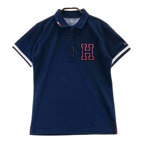 TOMMY HILFIGER GOLF トミー ヒルフィガーゴルフ 2022年モデル 半袖ポロシャツ 総柄 ネイビー系 サイズ：LL ランク：N【新品】 ゴルフウェア ポロシャツ 中古ゴルフウェア通販サイトSTST(ストスト)