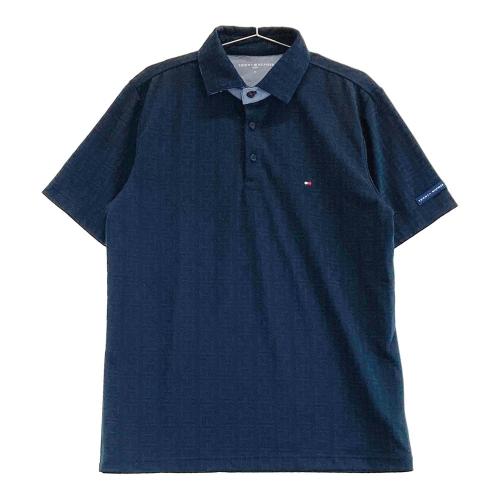 TOMMY HILFIGER GOLF トミー ヒルフィガーゴルフ 半袖ポロシャツ ロゴ総柄 ネイビー系 サイズ：XL ランク：A- 【中古】ゴルフウェア  ポロシャツ 中古ゴルフウェア通販サイトSTST(ストスト)