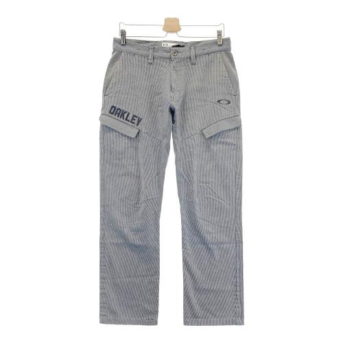 サイズ：XL OAKLEY オークリー FOA403508 ストレッチパンツ 千鳥格子柄 ネイビー系 [240101456442] ゴルフウェア メンズ ストスト OAKLEY オークリー FOA403508 ストレッチパンツ 千鳥格子柄