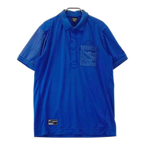 サイズ：XL OAKLEY オークリー 432534OJP 半袖ポロシャツ ロゴプリント 総柄 ブルー系 [240101472870] ゴルフウェア メンズ ストスト OAKLEY オークリー 432534OJP 半袖ポロシャツ ロゴプリント 総柄