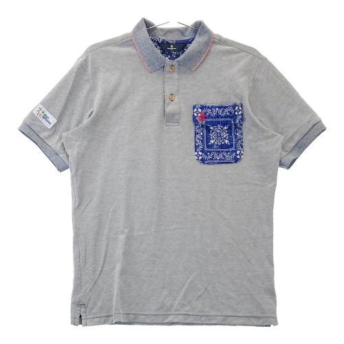 サイズ：M MUNSING WEAR マンシングウェア  半袖ポロシャツ ロゴプリント  ブラック系 [240101431112] ゴルフウェア メンズ ストスト MUNSING WEAR マンシングウェア 半袖ポロシャツ ロゴプリント
