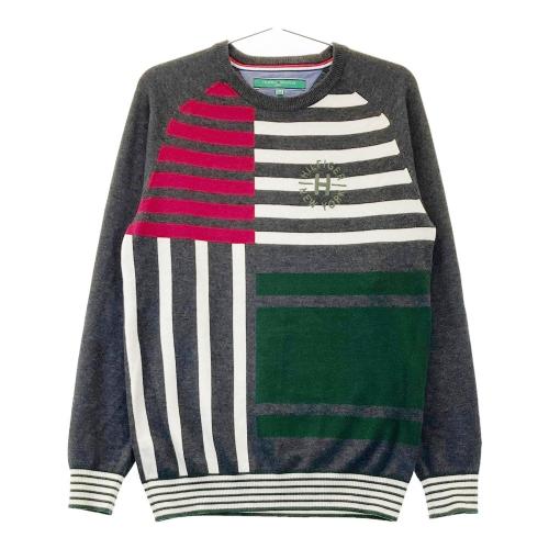 サイズ：L   GOLF トミー ヒルフィガーゴルフ  ニットセーター ロゴ 総柄 グレー系 [240101478290] ゴルフウェア メンズ ストスト TOMMY HILFIGER GOLF トミー ヒルフィガーゴルフ ニットセーター