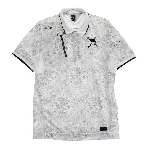サイズ：L OAKLEY オークリー FOA405168 ハーフパンツ 総柄 ホワイト系 [240101413442] ゴルフウェア メンズ ストスト OAKLEY オークリー FOA405168 ハーフパンツ 総柄 ホワイト系 L