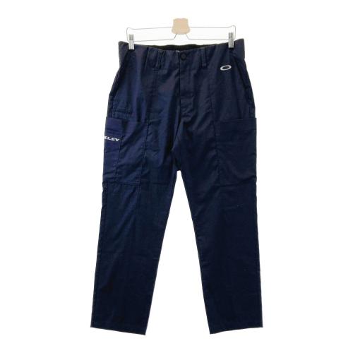 サイズ：XL OAKLEY オークリー FOA403508 ストレッチパンツ 千鳥格子柄 ネイビー系 [240101456442] ゴルフウェア メンズ ストスト OAKLEY オークリー FOA403508 ストレッチパンツ 千鳥格子柄