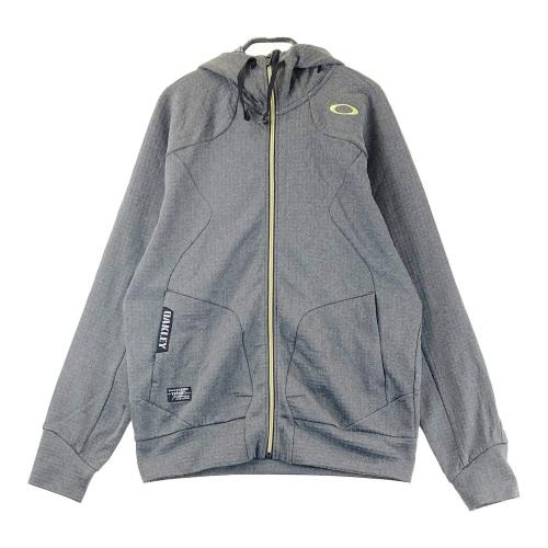 サイズ：M OAKLEY オークリー  ジップジャケット  グレー系 [240101427637] ゴルフウェア メンズ ストスト OAKLEY オークリー ジップジャケット グレー系 サイズ：M ランク