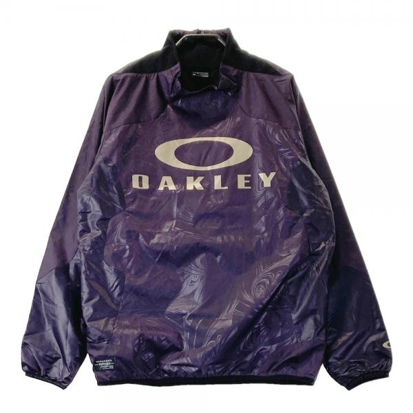 サイズ：M OAKLEY オークリー  モックネックブルゾン 総柄 パープル系 [240101478165] ゴルフウェア メンズ ストスト OAKLEY オークリー モックネックブルゾン 総柄 パープル系