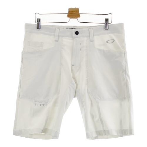 サイズ：L OAKLEY オークリー FOA405168 ハーフパンツ 総柄 ホワイト系 [240101413442] ゴルフウェア メンズ ストスト サイズ：L OAKLEY オークリー FOA405168 ハーフパンツ 総柄