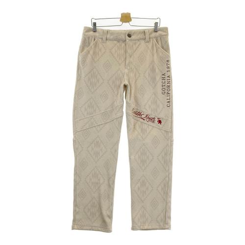 サイズ：XXL GOTCHA ガッチャ  ハーフパンツ ロゴ総柄 レッド系 [240101458098] ゴルフウェア メンズ ストスト GOTCHA ガッチャ ハーフパンツ ロゴ総柄 レッド系 サイズ：XXL