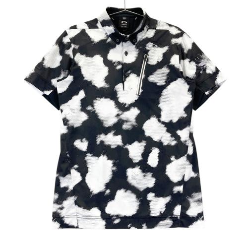 サイズ：XL OAKLEY オークリー FOA400844 半袖ポロシャツ ロゴプリント 総柄 ブラック系 [240101472864] ゴルフウェア メンズ ストスト OAKLEY オークリー FOA400844 半袖ポロシャツ ロゴプリント 総柄