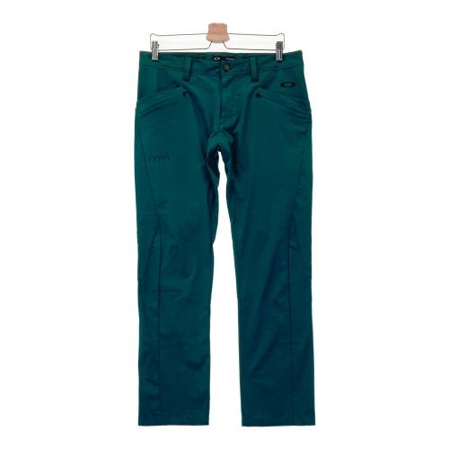 OAKLEY オークリー ジップ ナイロンジャケット 総柄 グリーン系 サイズ